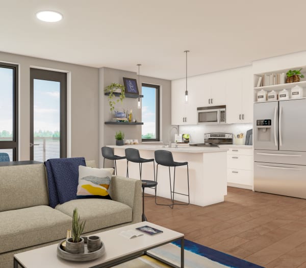 A rendering of a living room and kitchen of The Columbia at the Waterfront in Vancouver, Washington