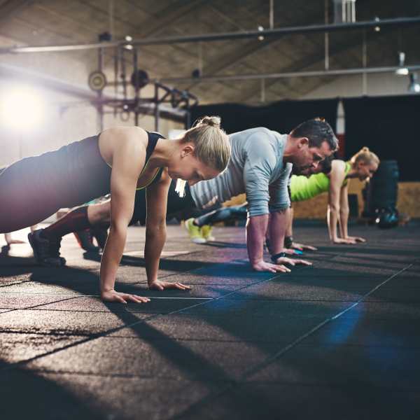 Residents workout in the fitness center at The Plaza Taos, Chandler, Arizona