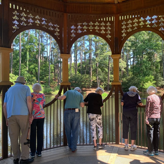 Residents at a lake The Foothills Retirement Community in Easley, South Carolina