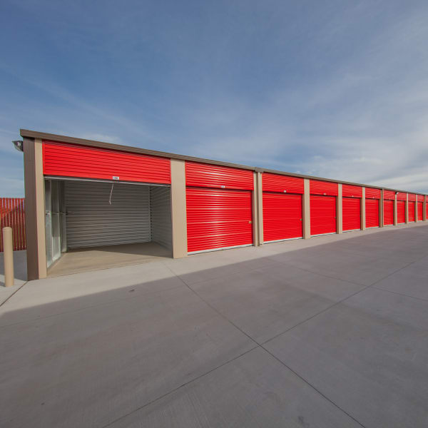 Outdoor storage units with red doors at StorQuest Express Self Service Storage in Phoenix, Arizona