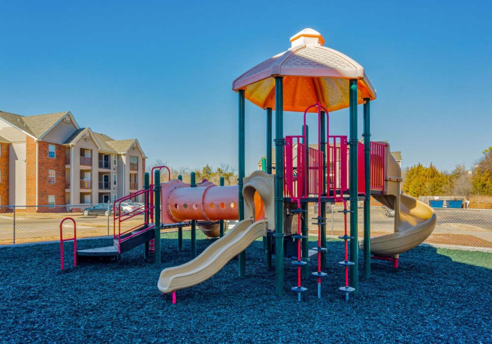 Playground with community view at Boomer Creek Apartments in Stillwater, Oklahoma