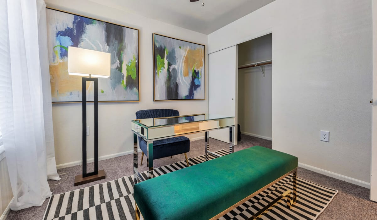 Elegant desk area with paintings at Estates at Palm Bay in Fort Walton Beach, Florida