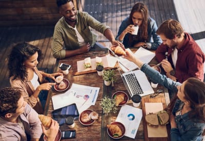 Residents and friends enjoying a meal near Ashley Oaks in San Antonio, Texas