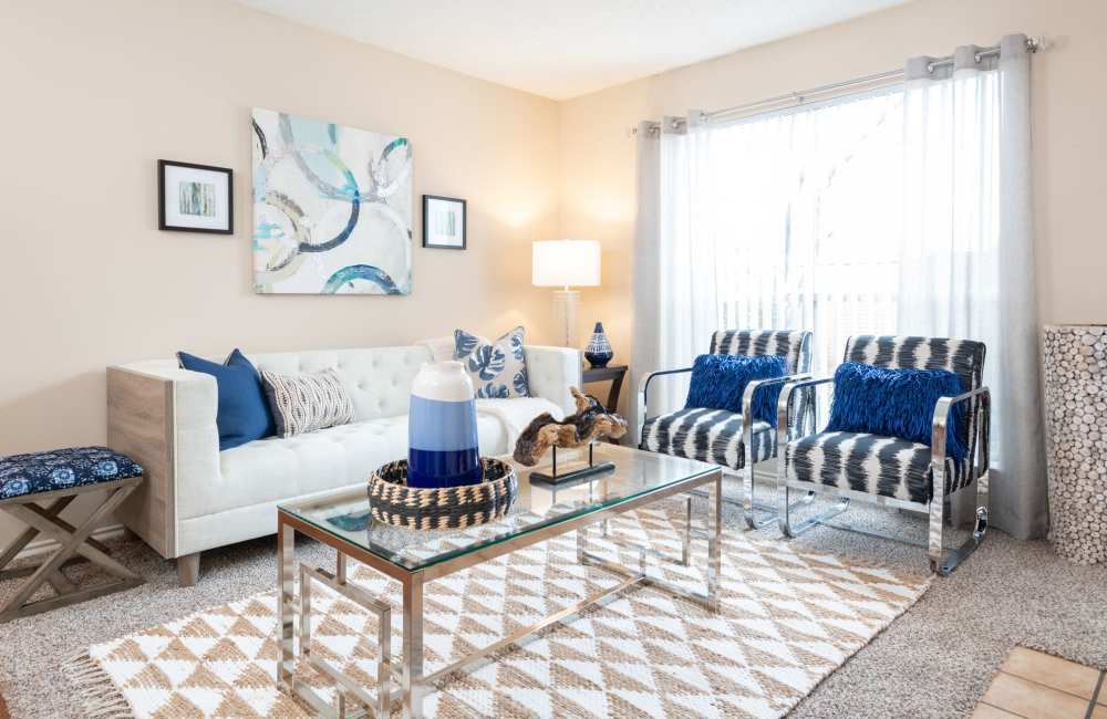 Inviting living space with modern decor and ample natural light at Charter Oak in Euless, Texas.