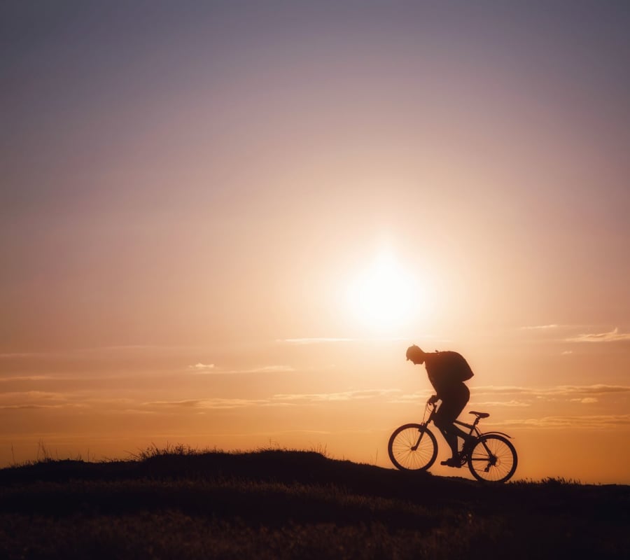 Resident cycling in the nature near The Overlook at Keystone Canyon in Reno, Nevada