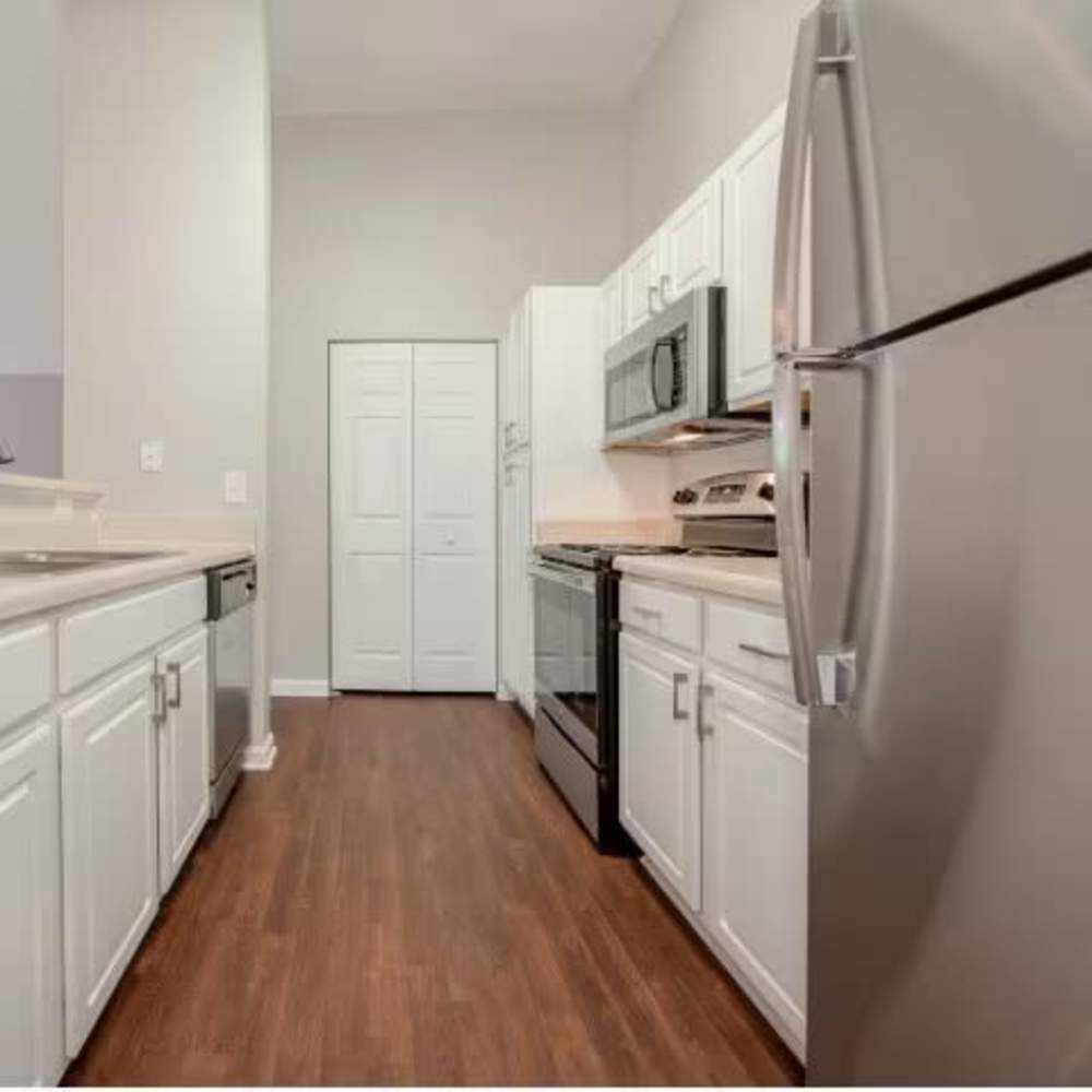 Kitchen at Arbors at Fairview Apartments in Simpsonville, South Carolina