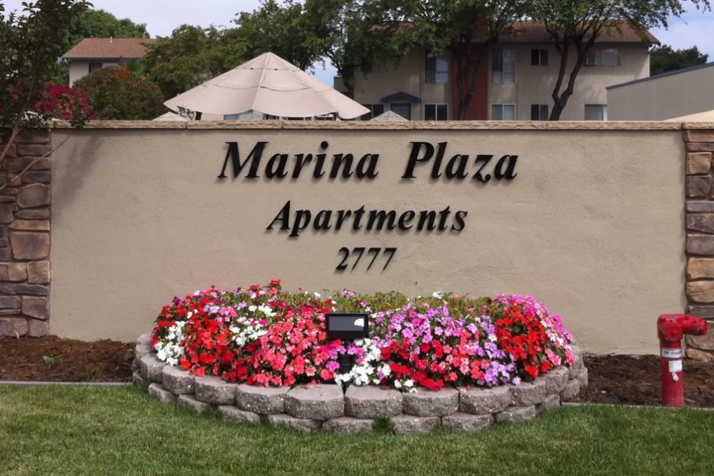 Sign outside of Marina Plaza Apartment Homes in San Leandro, California