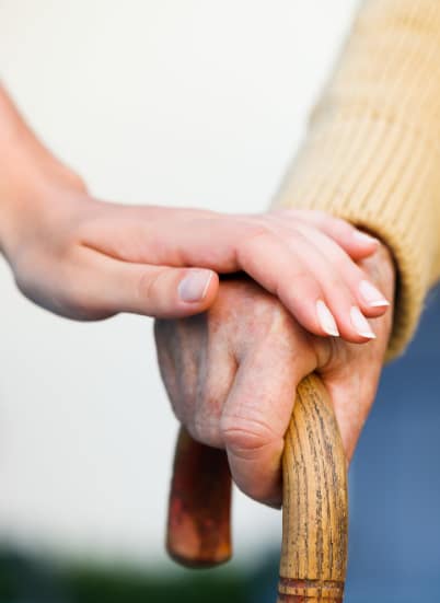 Couple holding hands and walking at The Montera in La Mesa, California