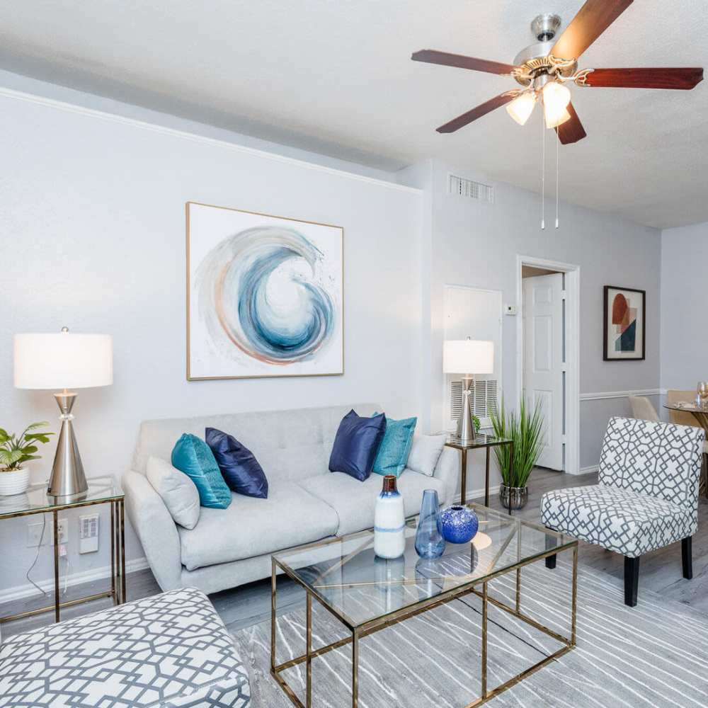 Living room with premium features at Green Tree Place in Houston, Texas