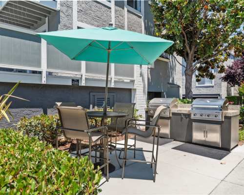 Patio with barbeque and table at Shadowcreek Apartment Homes, Campbell, California