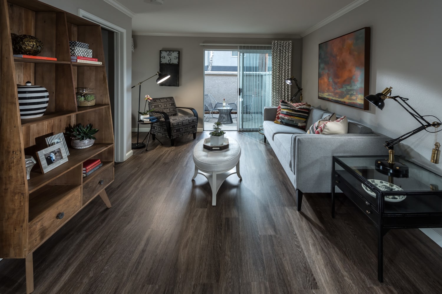 Modern living room with hardwood floors at Bella Vista Apartments in Santa Clara, California