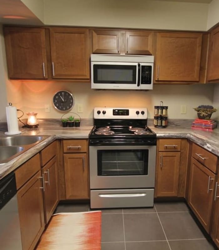 Kitchen with granite countertops at The Icon at Lubbock in Lubbock, Texas