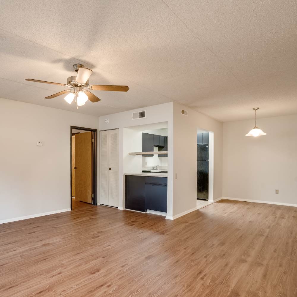 Living room with wooden flooring at Germantown Gardens in East Ridge, Tennessee