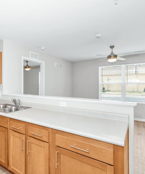 Beautiful and spacious living area with open kitchen at The Lenox in Augusta, Georgia