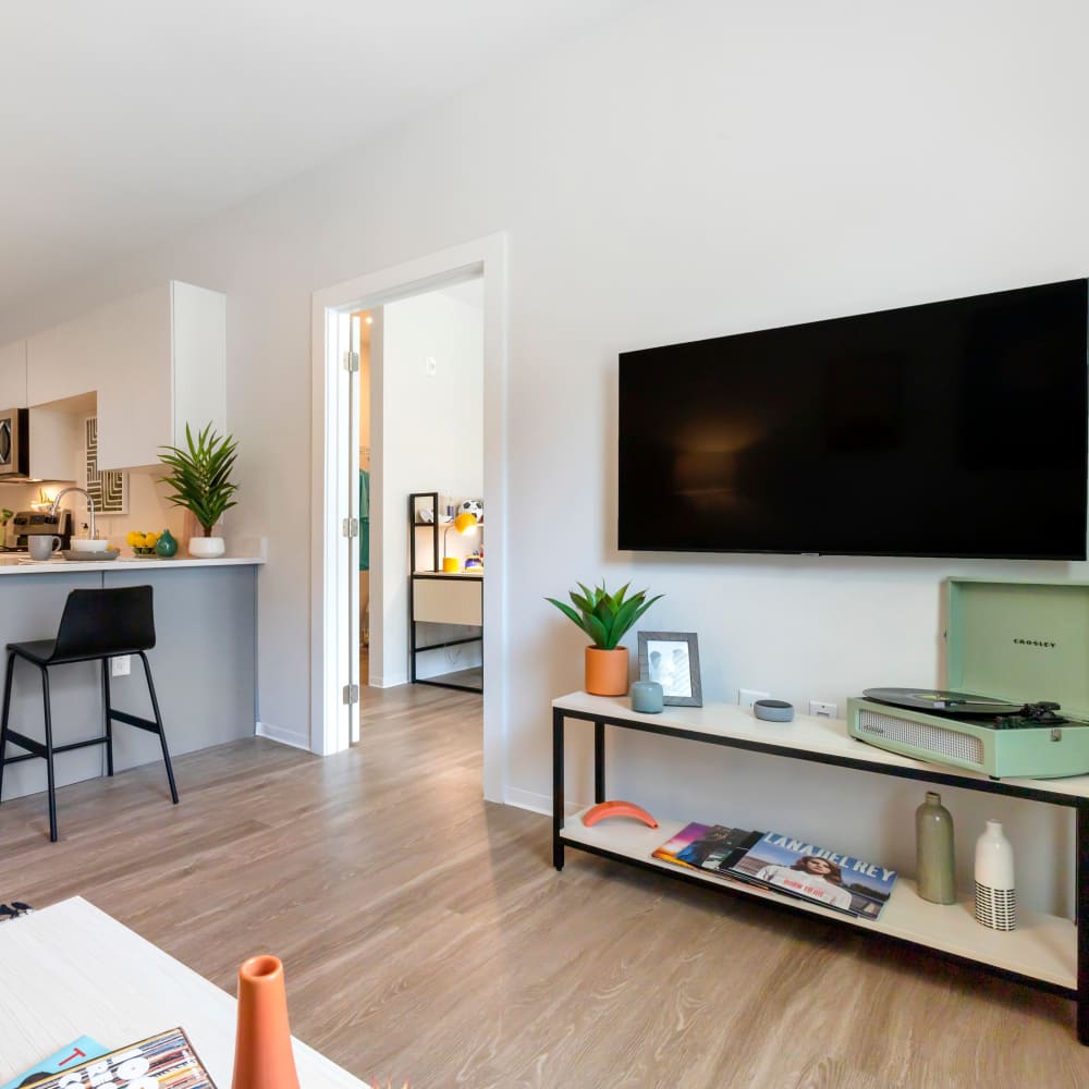 Fully equipped kitchen with stainless steel appliances at UNCOMMON Raleigh in Raleigh, North Carolina