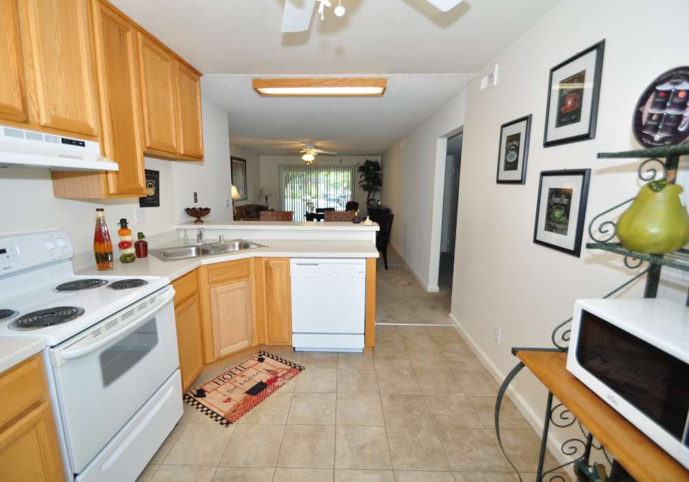 Apartment kitchen with corian countertops at The Hills in San Diego, California