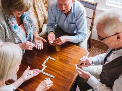 Residents playing majong at Randall Residence of West Milton in West Milton, Ohio