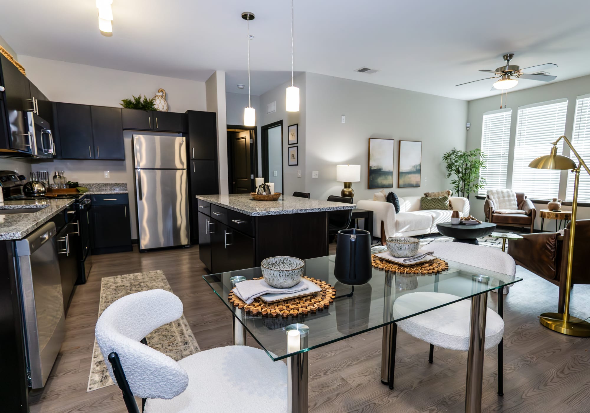 Open concept living room and kitchen at Wrenfield at Pleasant View in Madison, Wisconsin