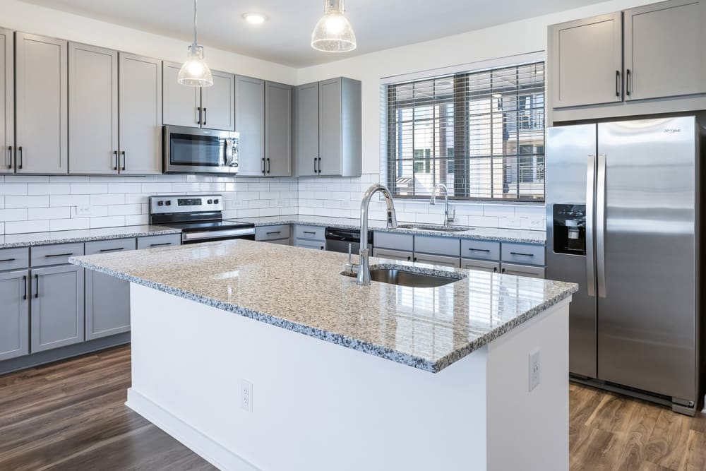 Modern kitchen with stainless-steel appliances at The Murray in Summerville, South Carolina