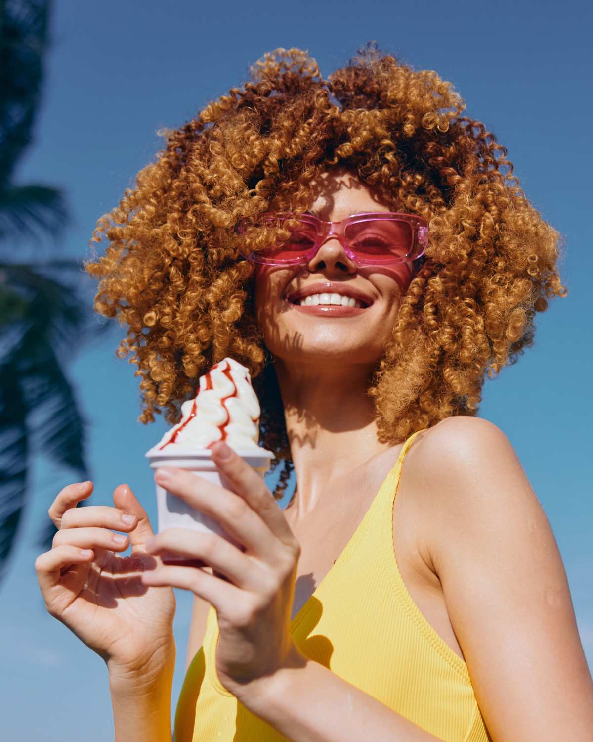 Stock Image of woman enjoying ice cream at Continuum