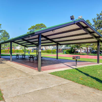 Covered picnic area with BBQ stations and picnic tables at Ben Moreell in Norfolk, Virginia