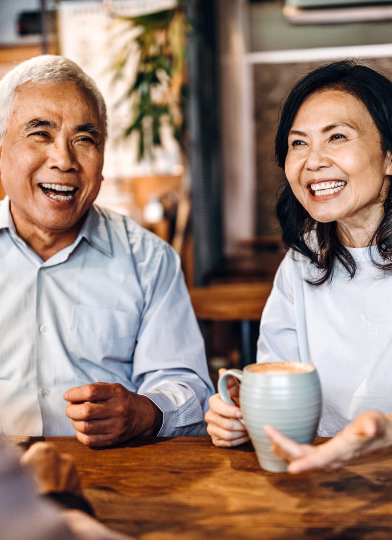 Residents enjoying a cup of coffee near Marquis at Deerfield in San Antonio, Texas