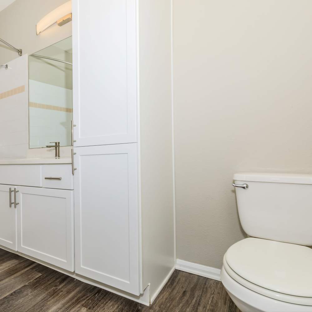 Bathroom with white appliances at The Dakota at Governors Ranch in Littleton,Colorado