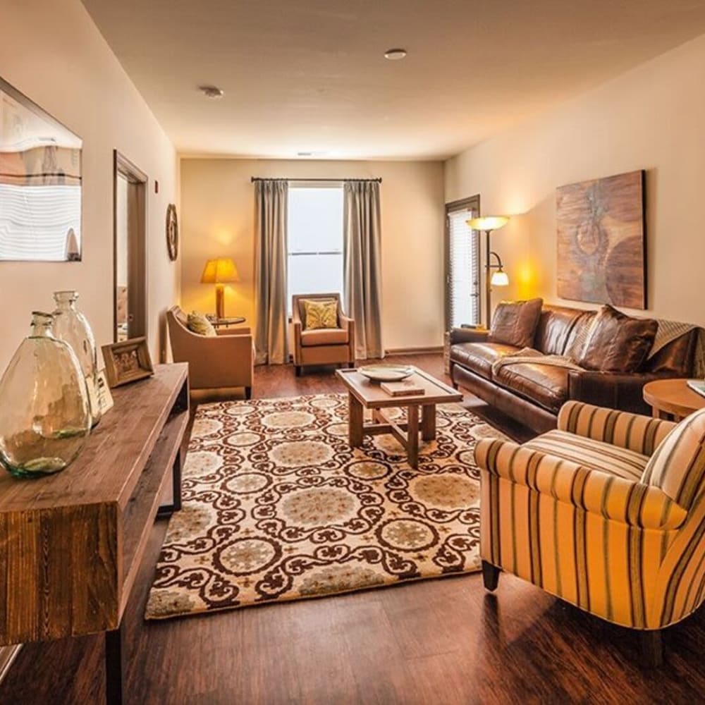 Model apartment with wood-style floor at LaCabreah, Brownsburg, Indiana