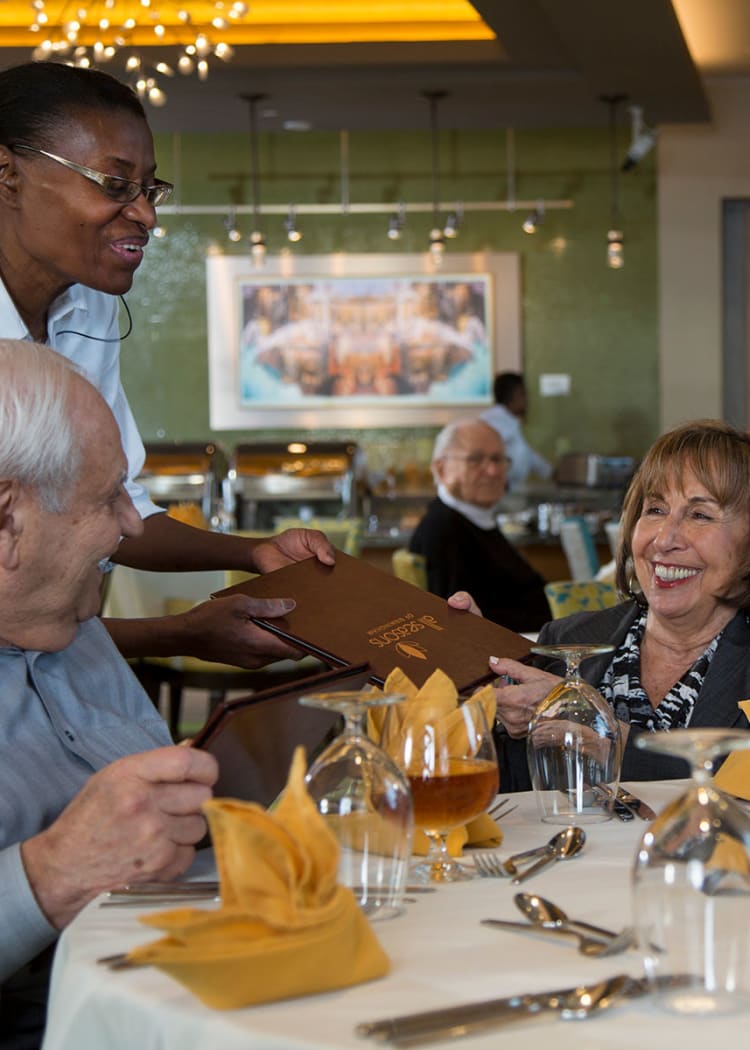 Residents completing their dinner order in one of our restaurant-style dining rooms at Casa Del Rio Senior Living in Peoria, Arizona