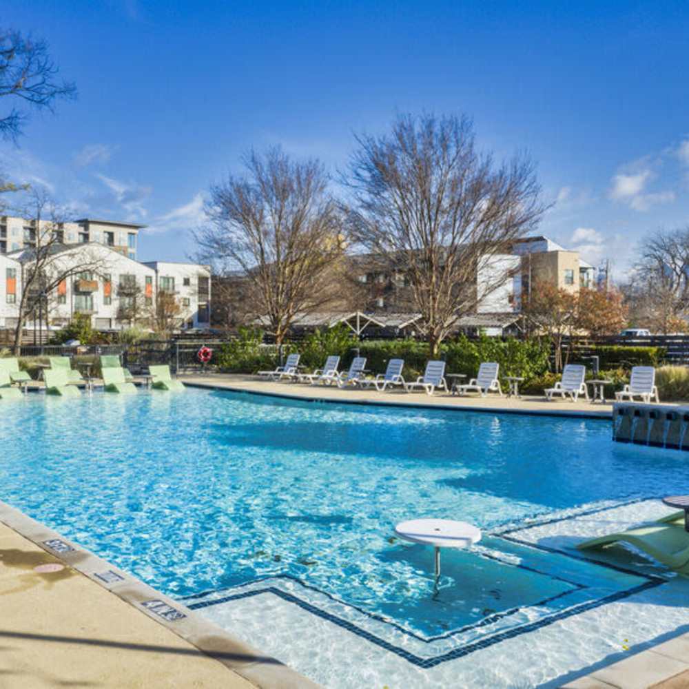 Resort-style swim-up pool at Pike West Commerce in Dallas, Texas