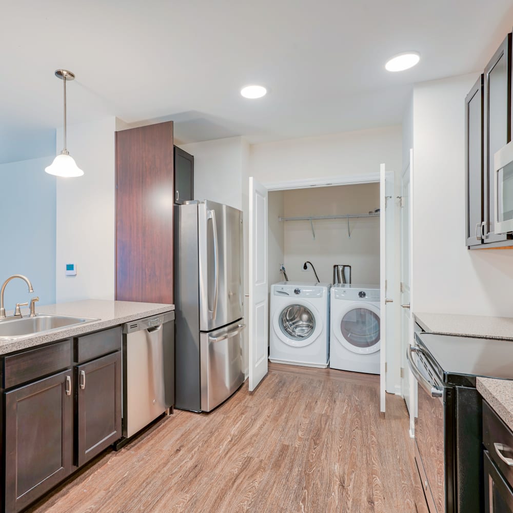 Kitchen with laundry closet at Pleasant Valley Apartments, Groton, Connecticut