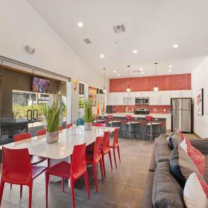 Clubhouse with kitchen and seating at Luxe @ Ocotillo in Chandler, Arizona