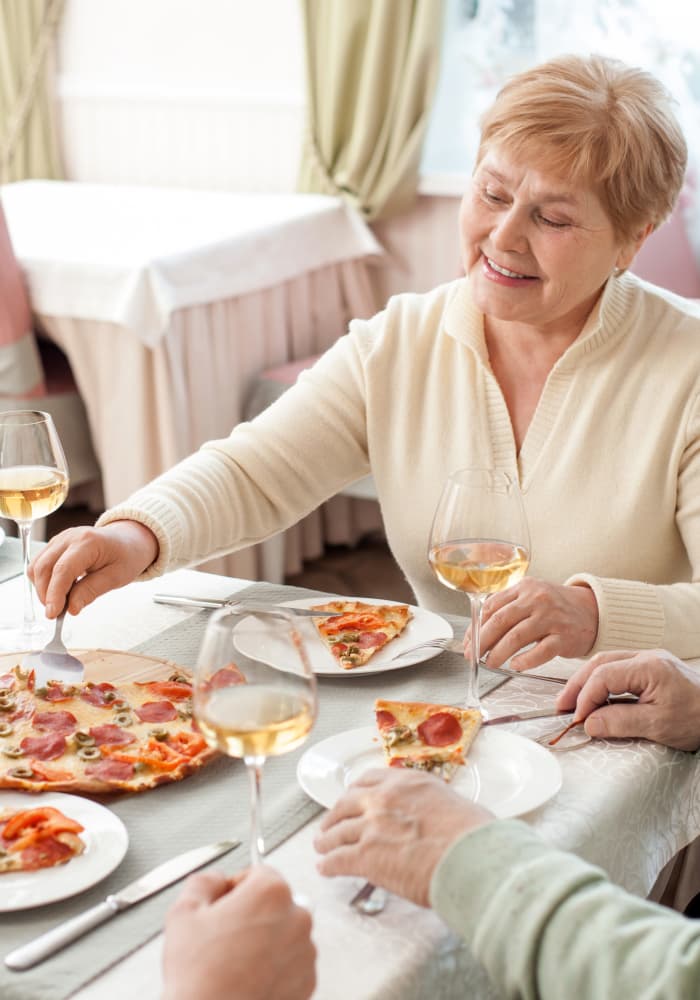 Residents of Village at Belmar enjoying a fantastic pizza made from scratch
