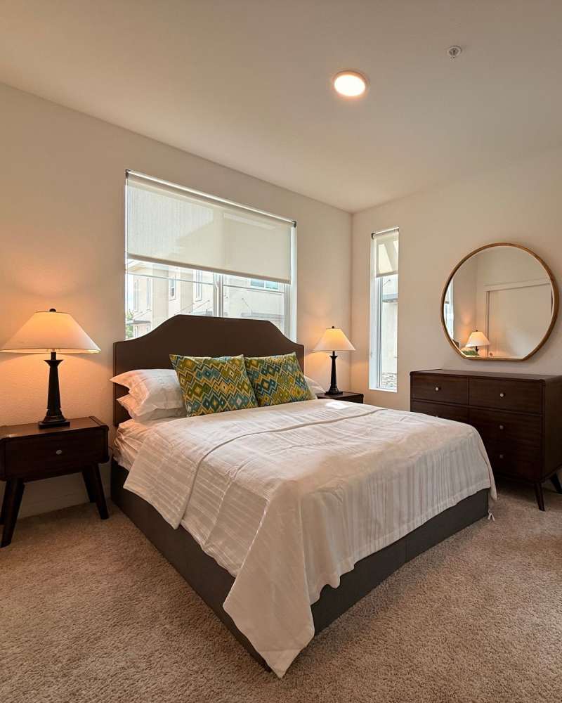 Furnished model bedroom at Eight Mile House in Stockton, California