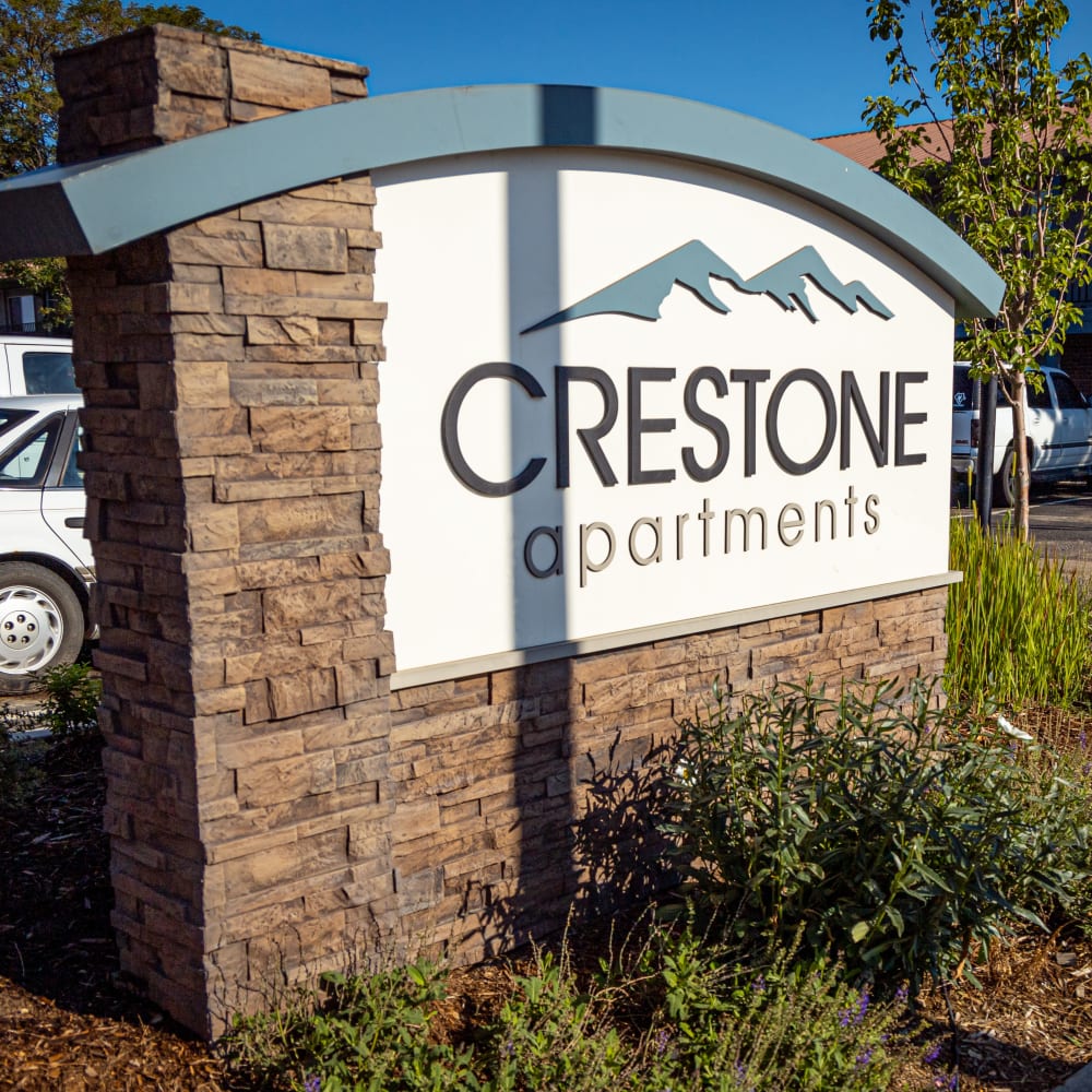 Front sign at Crestone Apartments in Brighton, Colorado