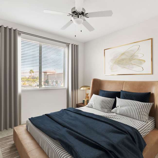 Specious bedroom with cozy bed at Harmony in Las Vegas, Nevada