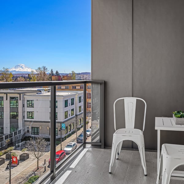 Apartment balcony with Mount Rainier view at The Verge in Auburn, Washington