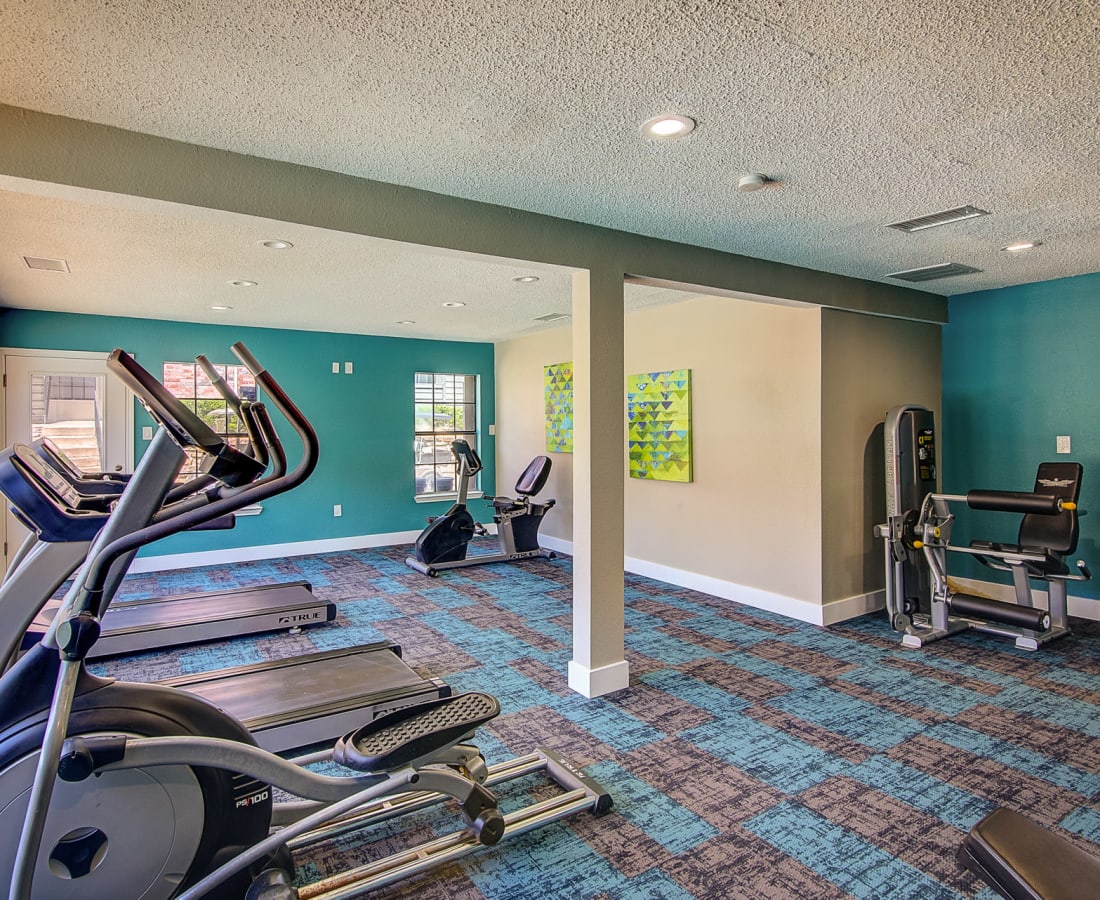 Cardio equipment in the fitness center at Canyon Grove in Grand Prairie, Texas