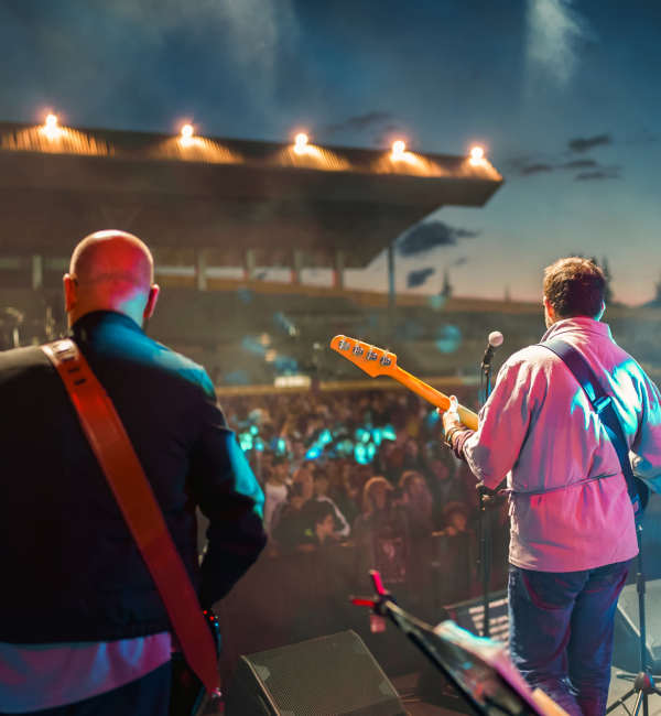 Musicians performing on stage with audience near Ardmore & Twenty Eighth in Atlanta, Georgia