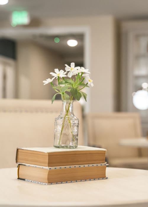 Beautiful vase of flowers on a small table at The Pillars of Lakeville in Lakeville, Minnesota
