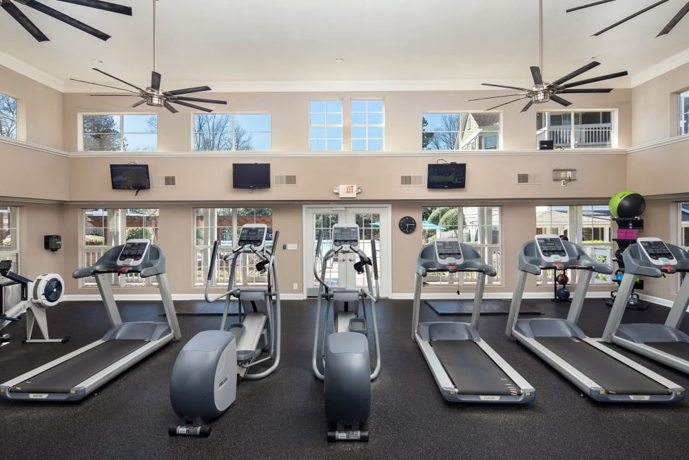 Modern Fitness Center with cardio strength machines at Wildwood Ridge Apartments in Atlanta, Georgia