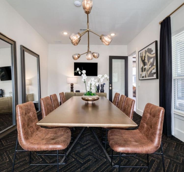 Meeting room with long table and comfortable chairs at Palmetto Pointe in San Antonio, Texas