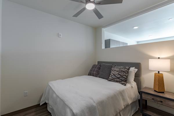 Bedroom with ceiling fan at Sable Station in Aurora, Colorado