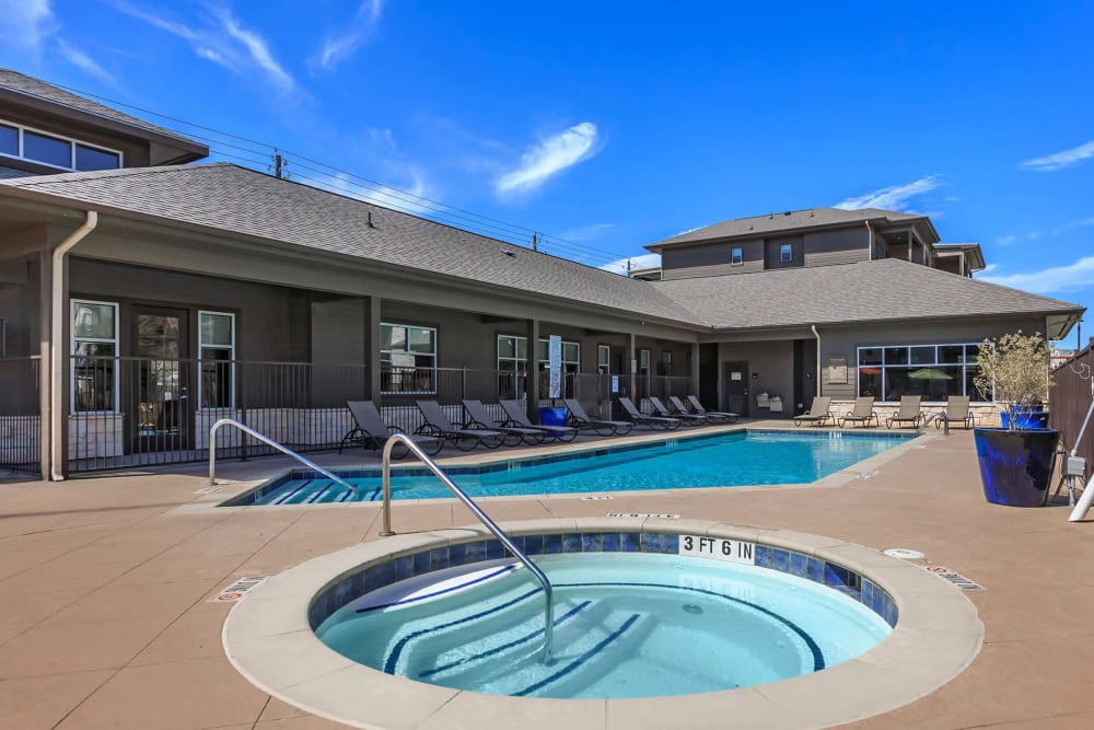 Hot tub by the pool at Lotus Village in Austin, Texas