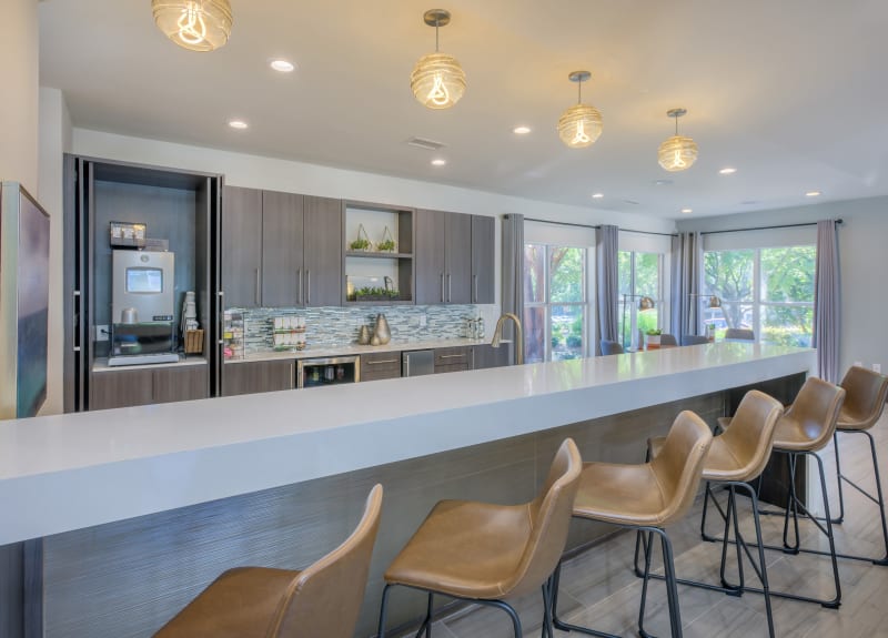 Bar seating in clubhouse at Presley Oaks in Charlotte, North Carolina