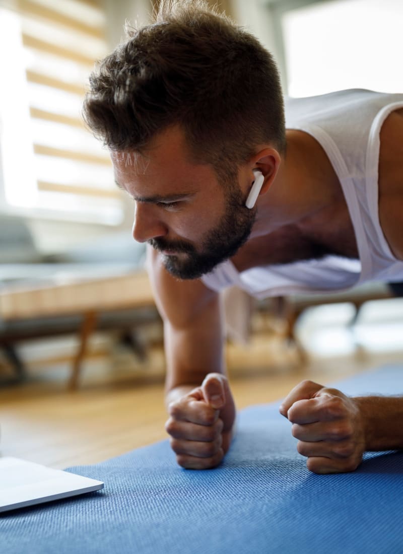 Resident exercising at home at Marquis at Desert Ridge in Phoenix, Arizona