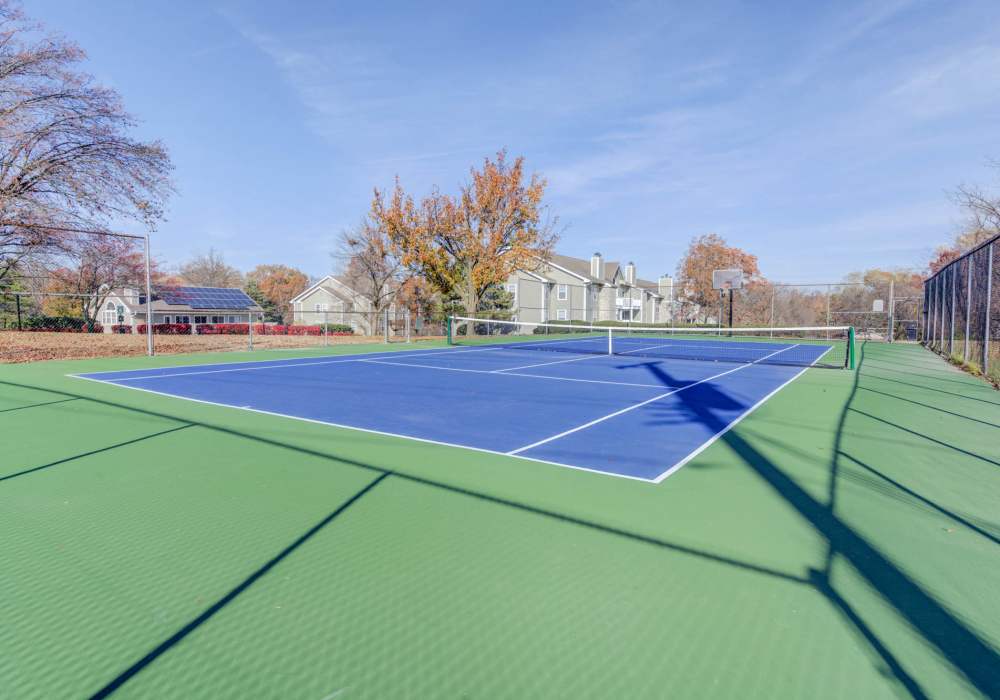Spacious tennis court at Bonhomme Village in Olivette. MO