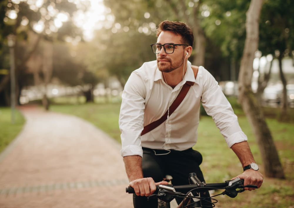 Resident biking on a path near Sherwood in Folsom, California