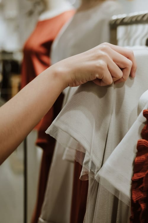 Resident browsing clothes at a local store near Parallel 36 at Liberty in Athens, Alabama