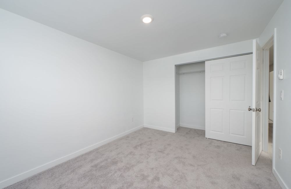 Bedroom with closet at The Sage Collection in Tacoma, Washington